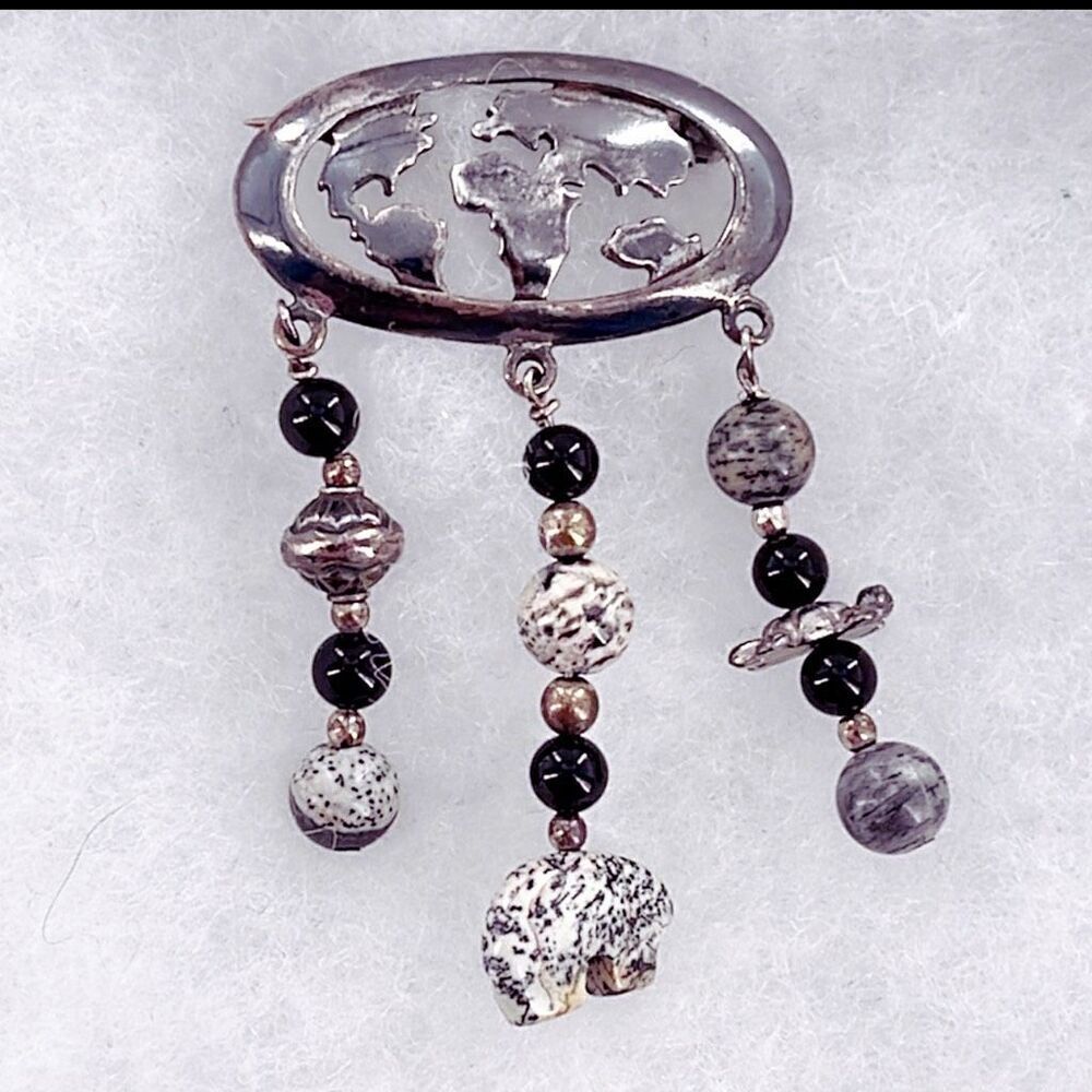 Vintage Native American sterling silver cutout world   brooch Hallmarked.
